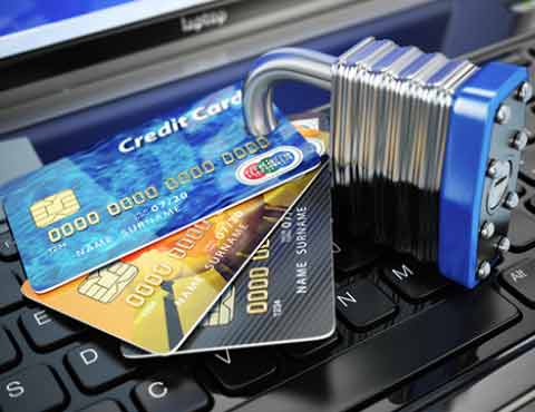 Credit cards with a lock through them.